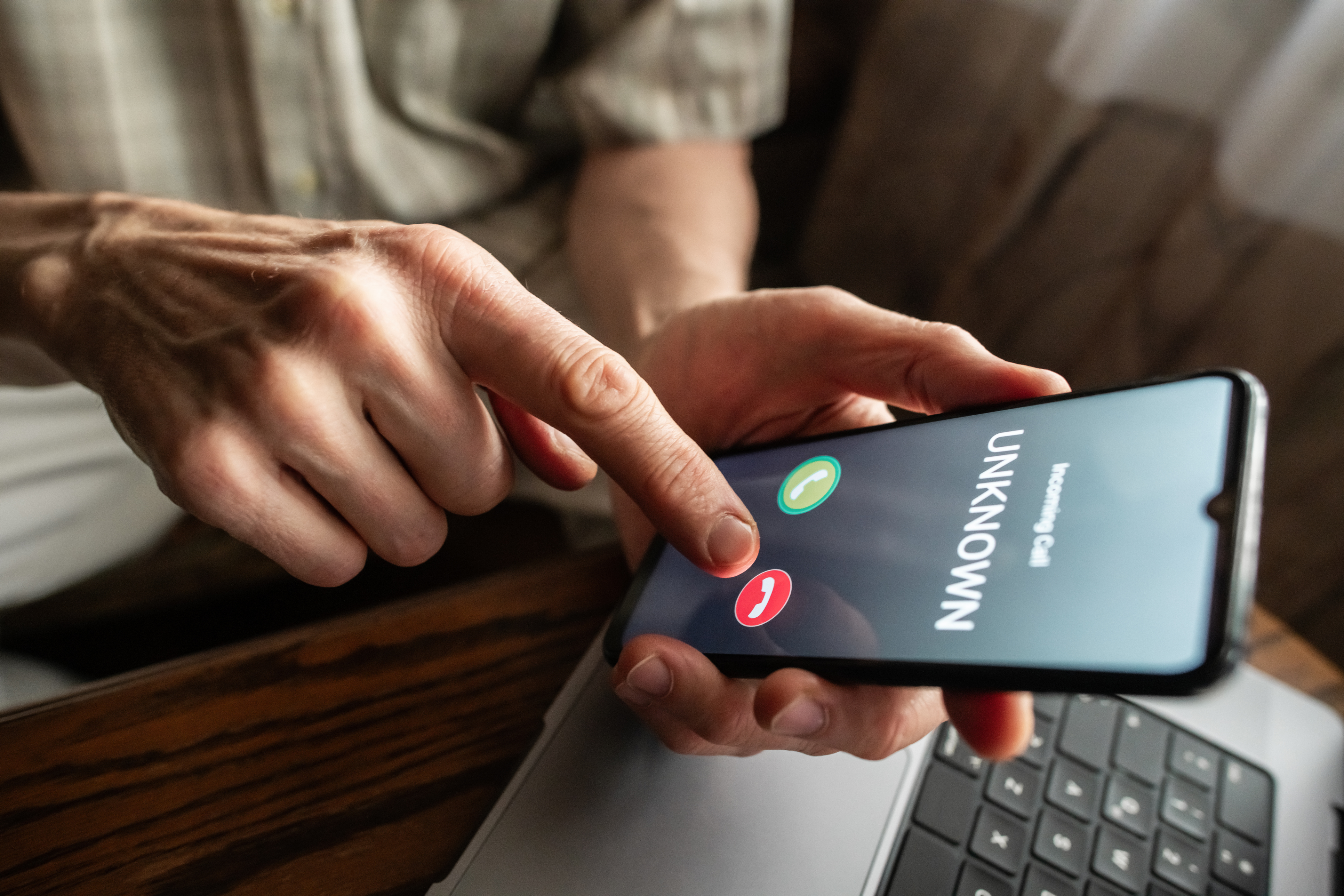 Person about to decline unknown phone call